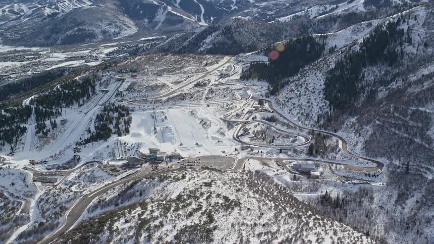 Road linking tosmall town close to the mountain in winter season