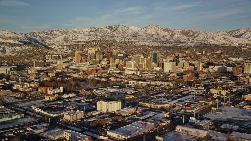 Aerial view of downtown area in the city and distant mountain range