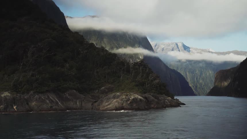 View of a river winding through mountains covered with vegetation