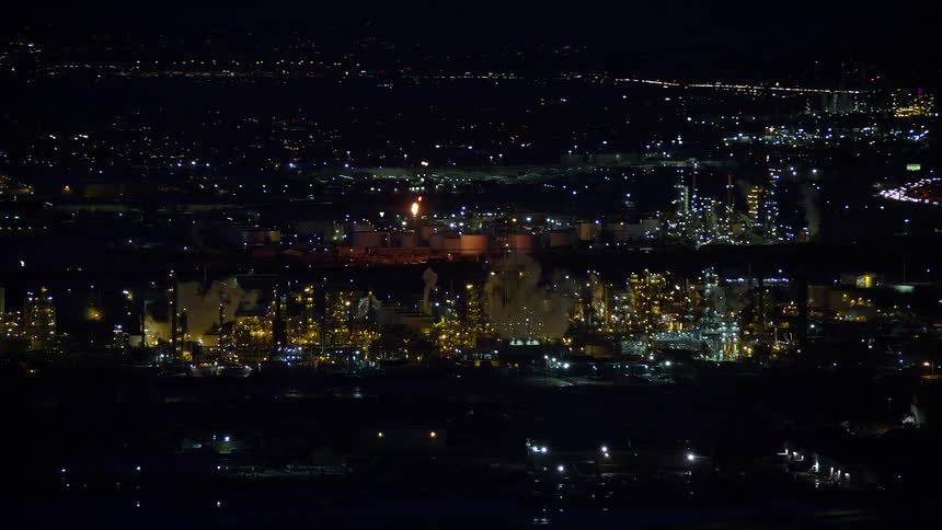 Traffic is running by the city at night