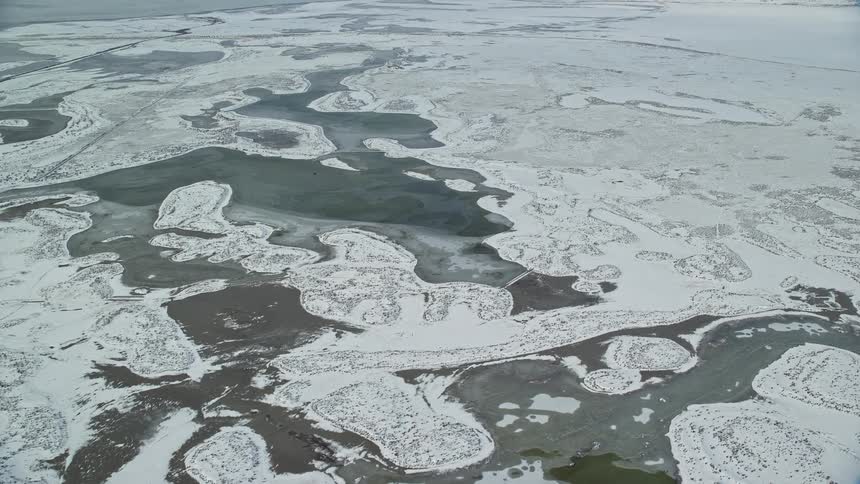 Aerial of a frozen sea during harsh winter