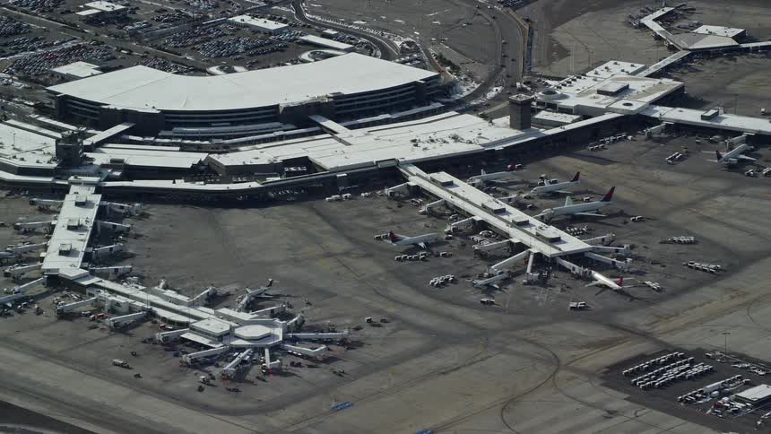 Aerial panorama of an airport with parked airplanes