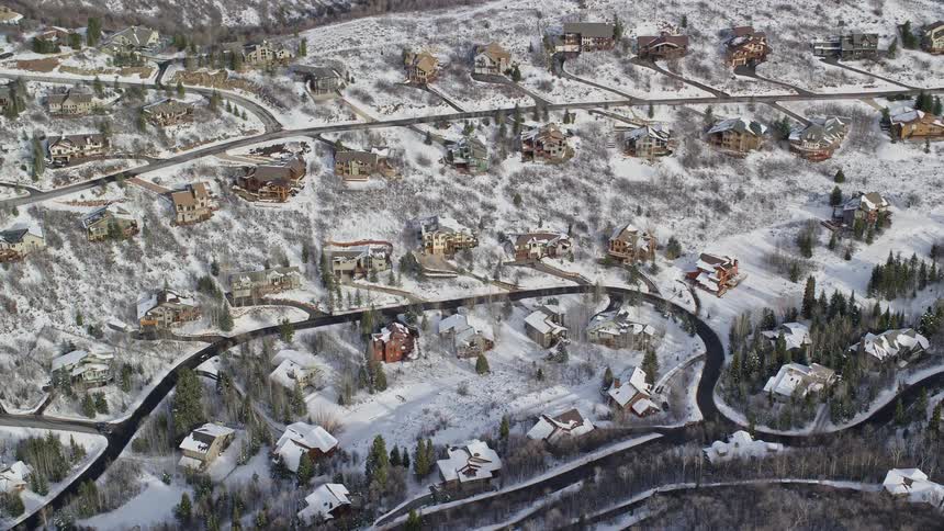 Skyline of a residential neighborhood on a hill during winter