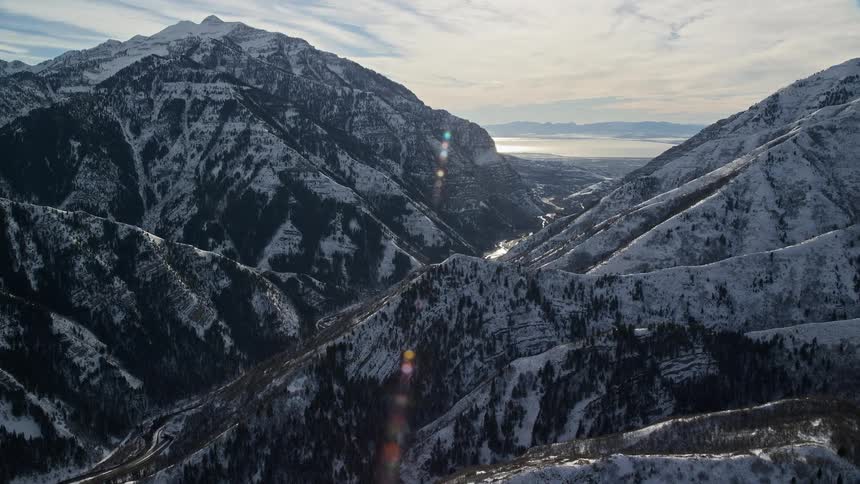 Aerial view of winter mountain pass during the day