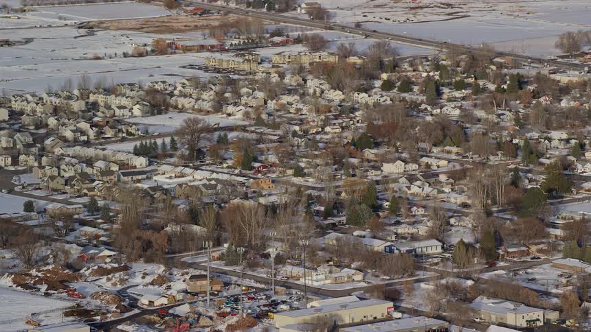 Aerial view of snowy residential area