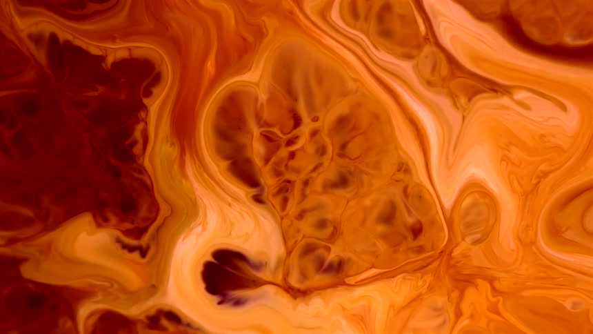 Abstract flowing brown inks bubbling and moving
