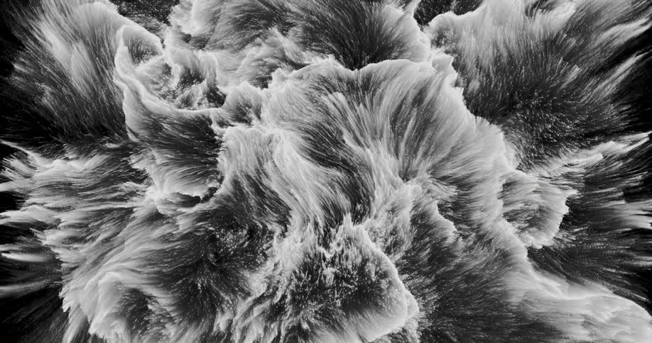 Black and white abstract 3D animation of moving particles