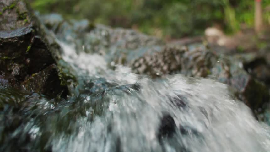 Torrential flow of water from the river
