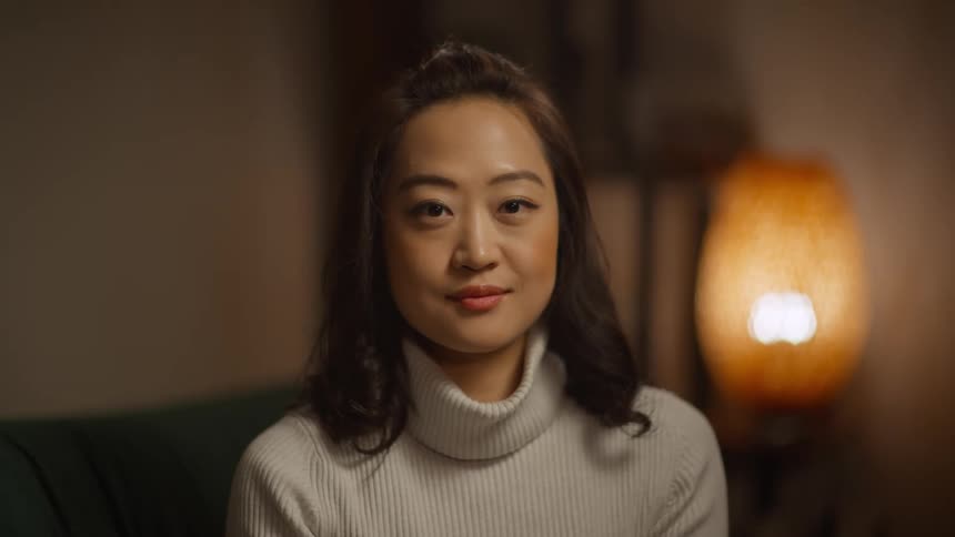 Portrait of a young asian woman with a slight smile