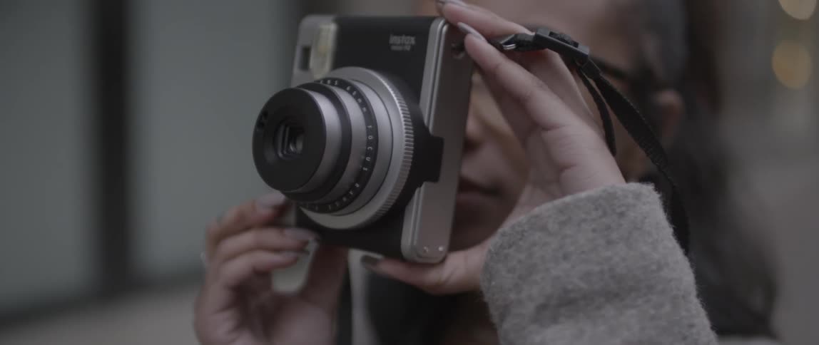 A woman is taking photographs