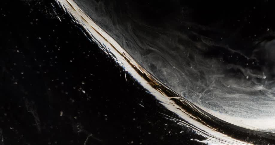 Extreme closeup of an abstract liquid bubble in slow motion