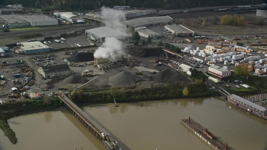 Aerial view of a waterfront factory