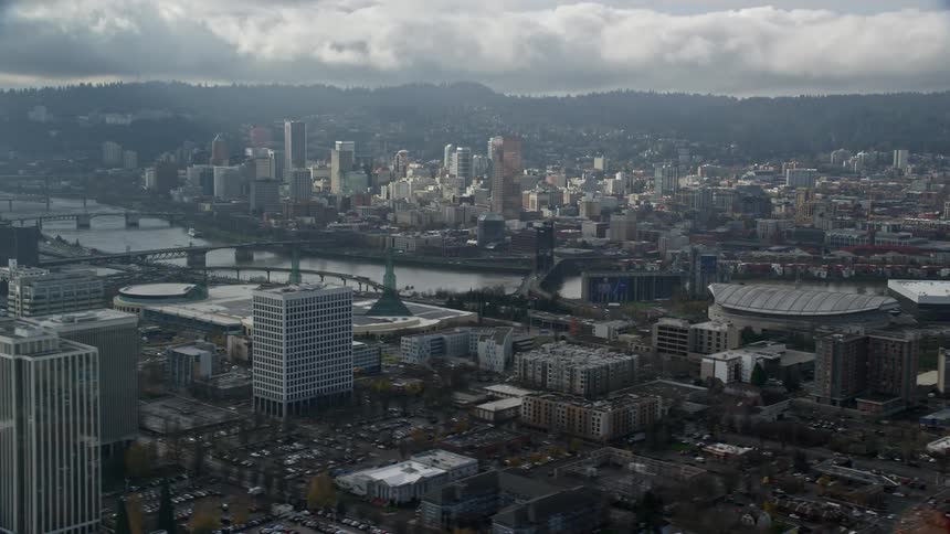 Aerial view of multiple bridges over a river flowing through a city
