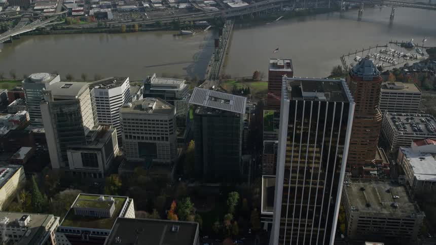 An aerial view of the downtown area near the lake in the city
