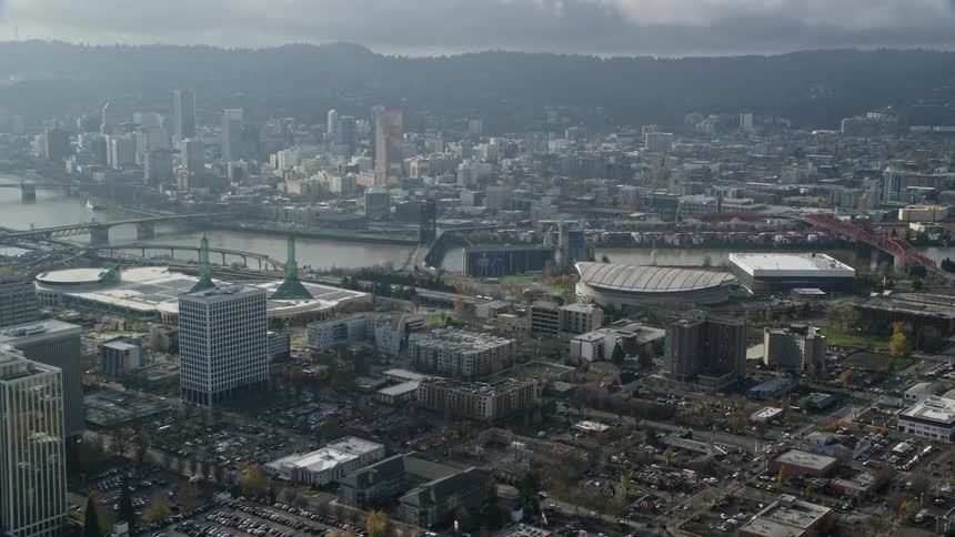 Aerial view of a large city with buildings and a river