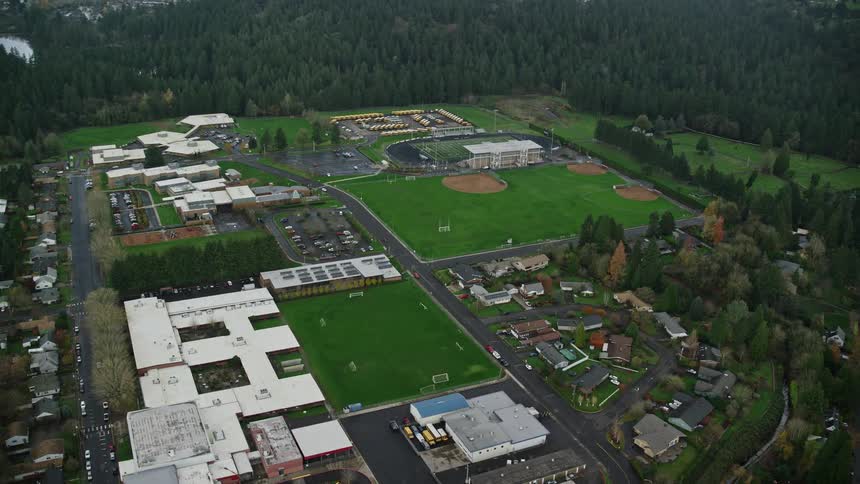 Aerial view of sports fields in a residential city