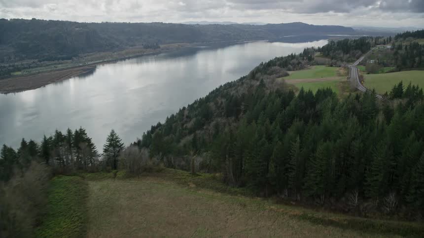 An aerial view of the woods closer to the river