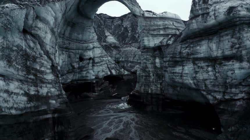 Ice caves in a shape of an arch