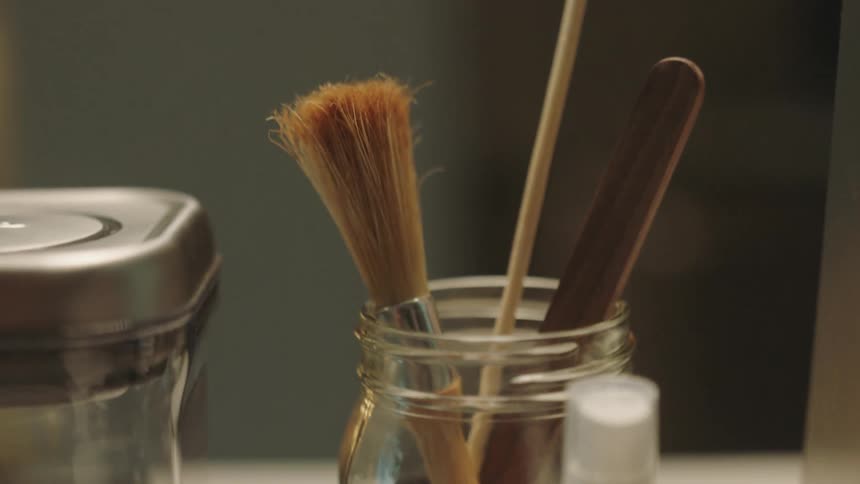 Closeup of makeup bottles on a shelf