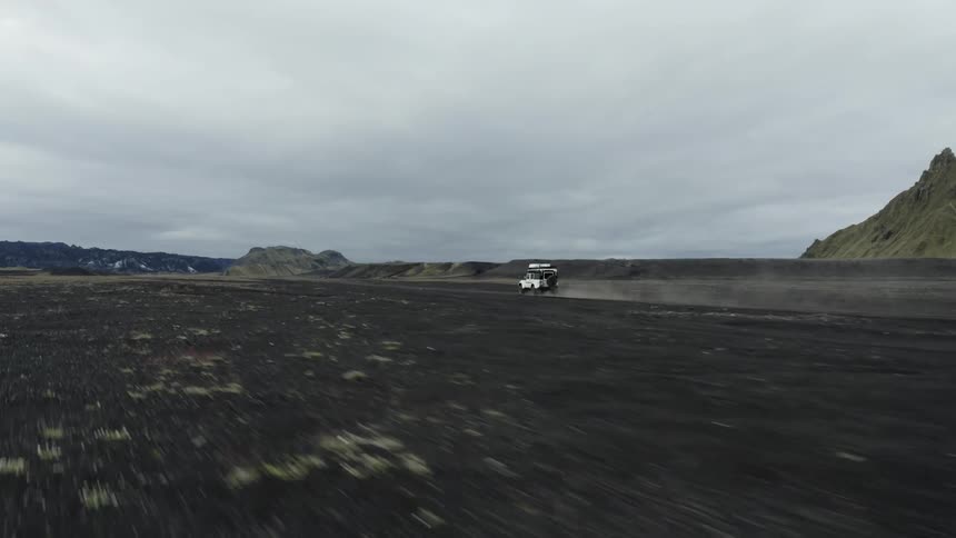 A vehicle is driving off road on the landscape