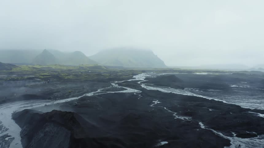Aerial of an Ice cave and a river