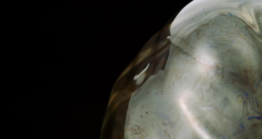 Colorful water bubble in slow motion