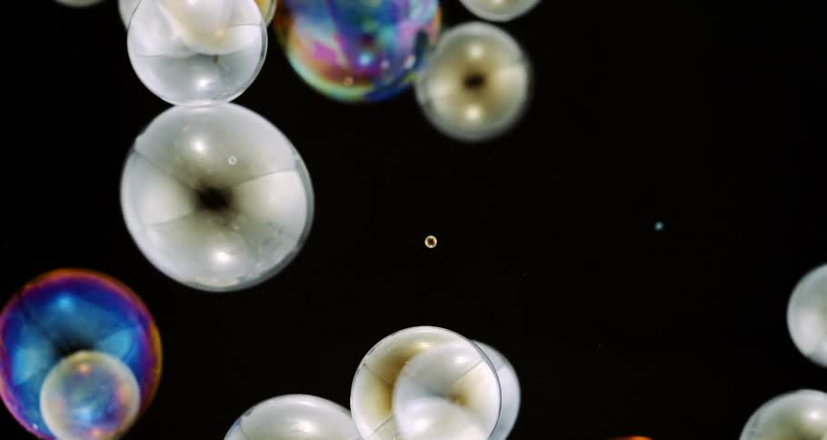 Colorful liquid bubbles in slow motion