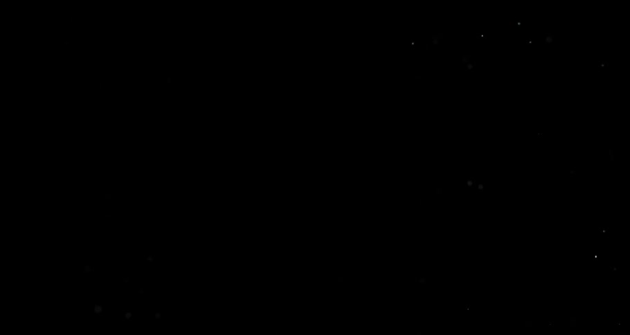 Filmy iridescent surface of large bubble bursts revealing a black background