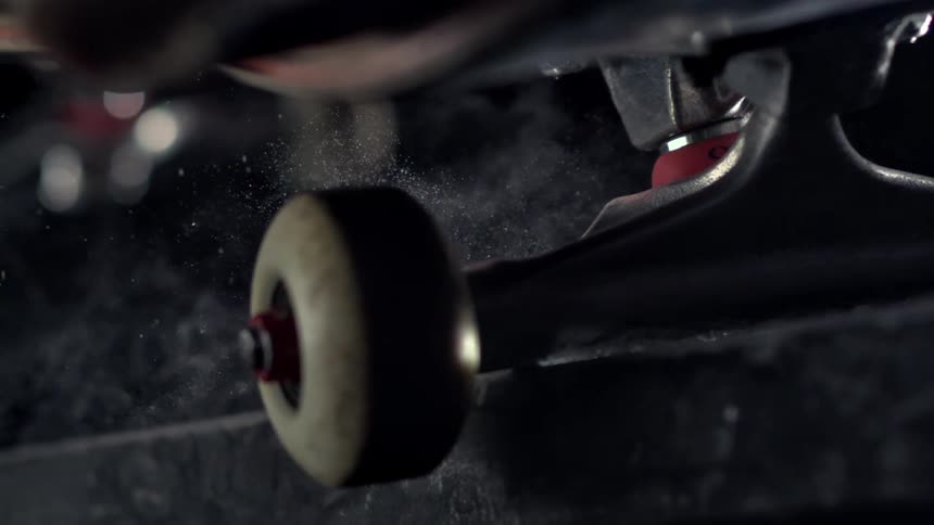 A skateboard rides over the edge
