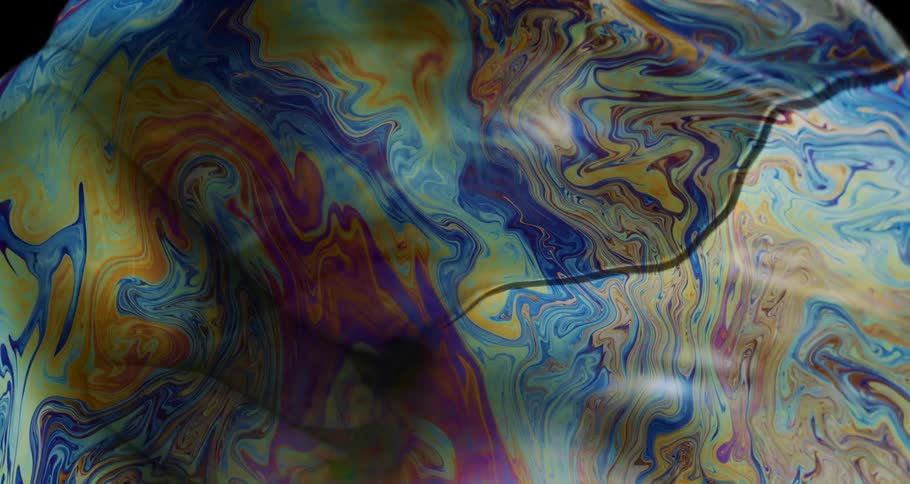 Shimmering surface of a large soap bubble
