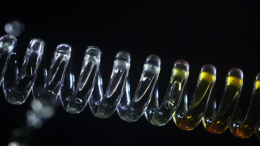 Clear and yellow liquid pass through the coils