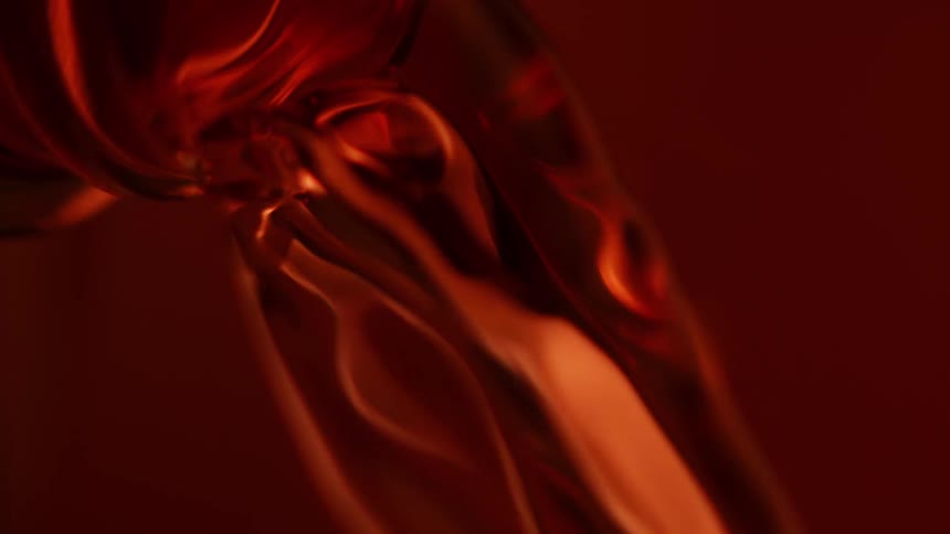 Liquid pours from the bottle