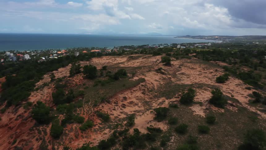 Aerial view of a coastal town next to the ocean