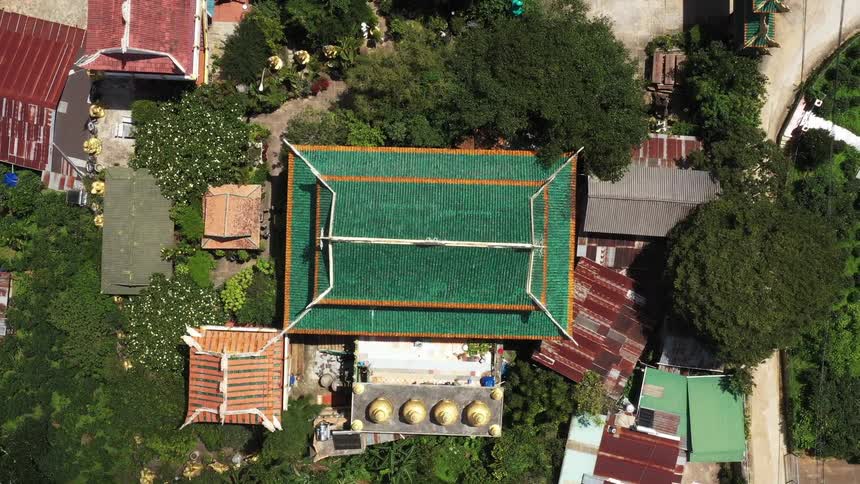 Aerial of a house in the suburb on a sunny day