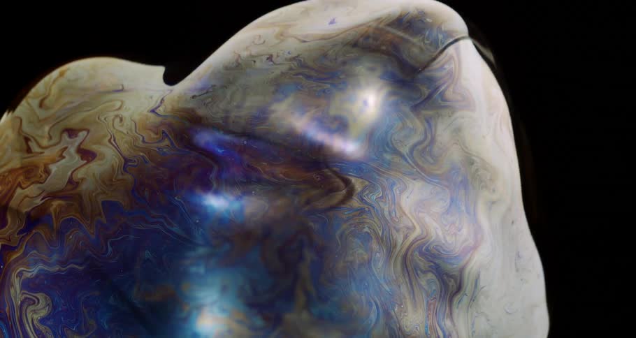 Extreme closeup of a colorful and dense bubble