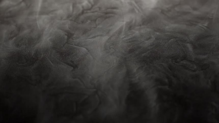 Smoke flowing over abstract ground