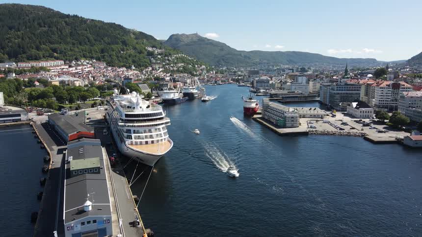 Aerial of the port area of a city with ships anchored in the port