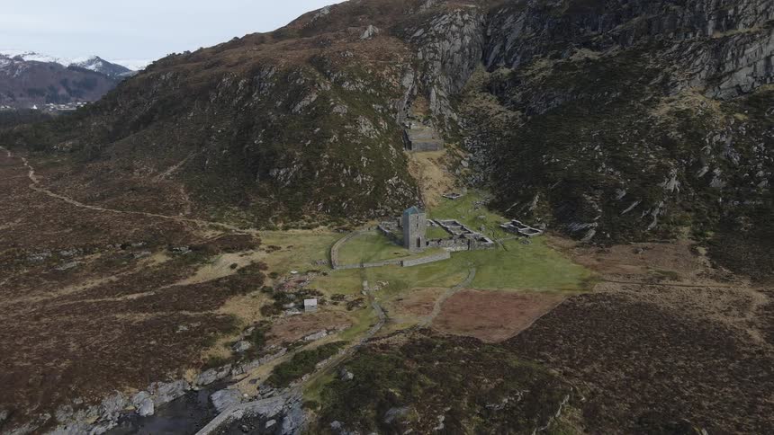 Aerial view of an ancient castle in the mountains