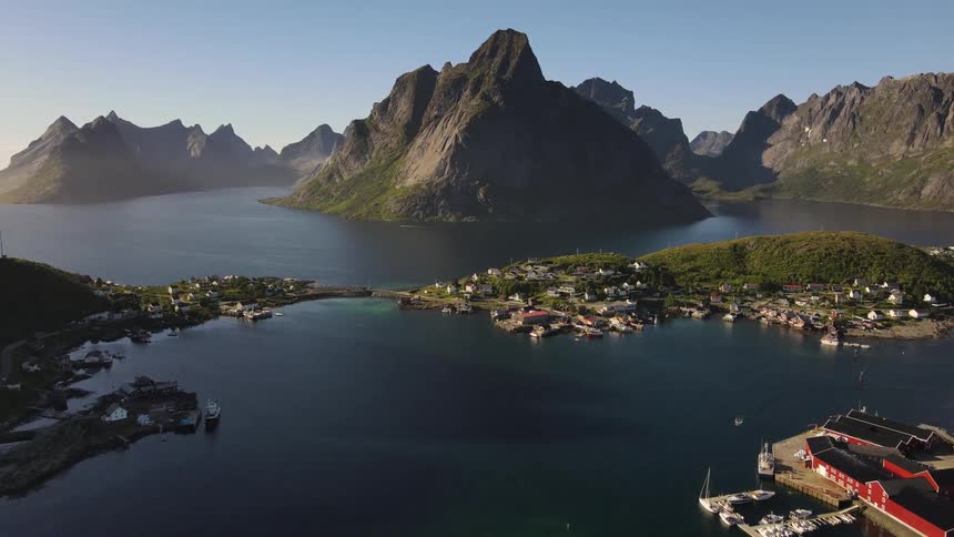 Aerial view of the island with boats anchored in the mountains during the day