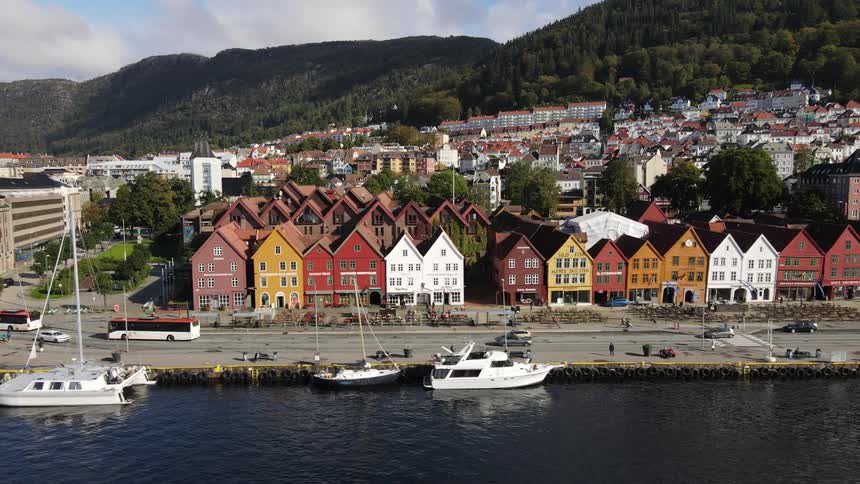 Panorama of an urban city by the sea with yachts in docks
