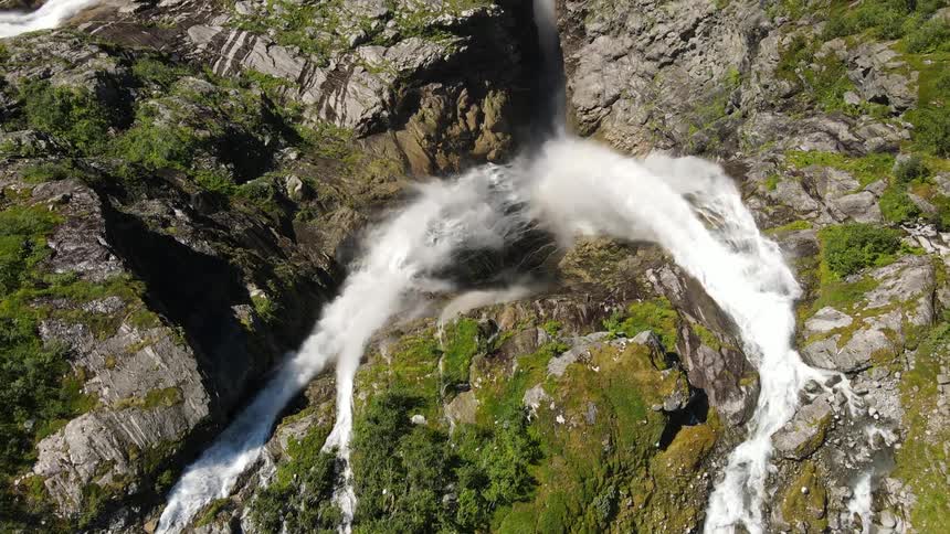 Aerial view of waterfall cascading down a cliff