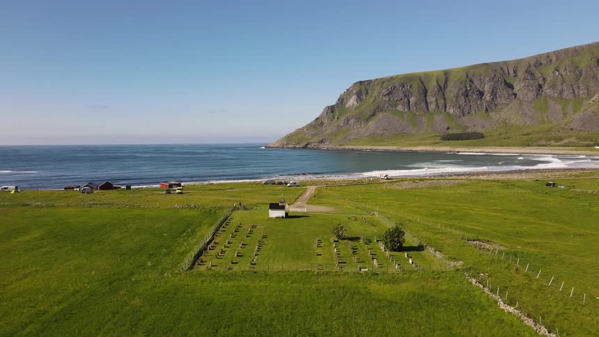 Aerial of a cemetery in a small coastal town