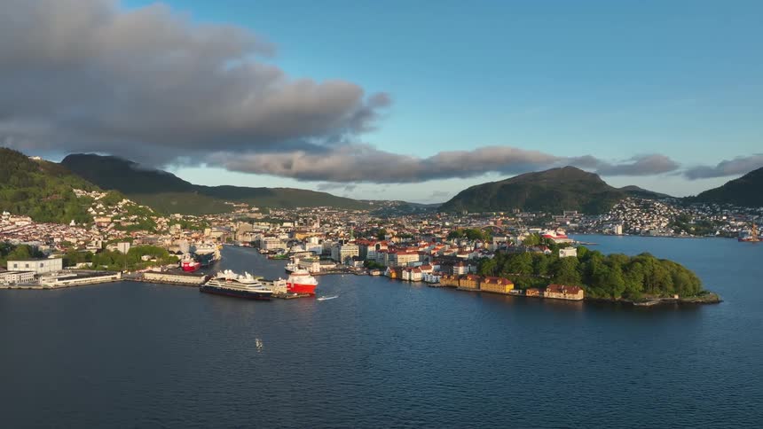 Aerial view of a coastal city with a port