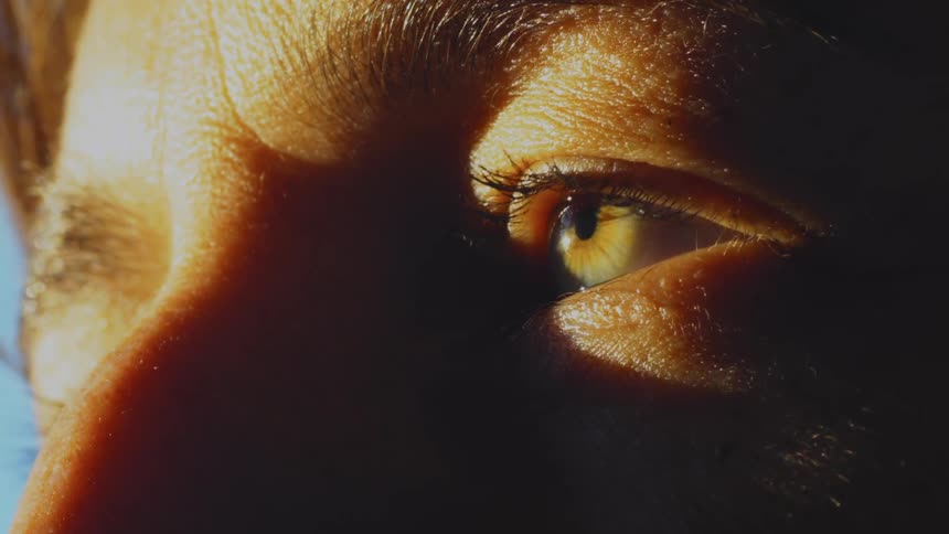 A man blinks his eyes