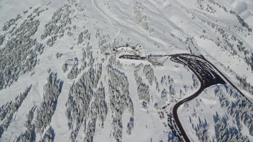 Aerial of a road on a snowwhite plain