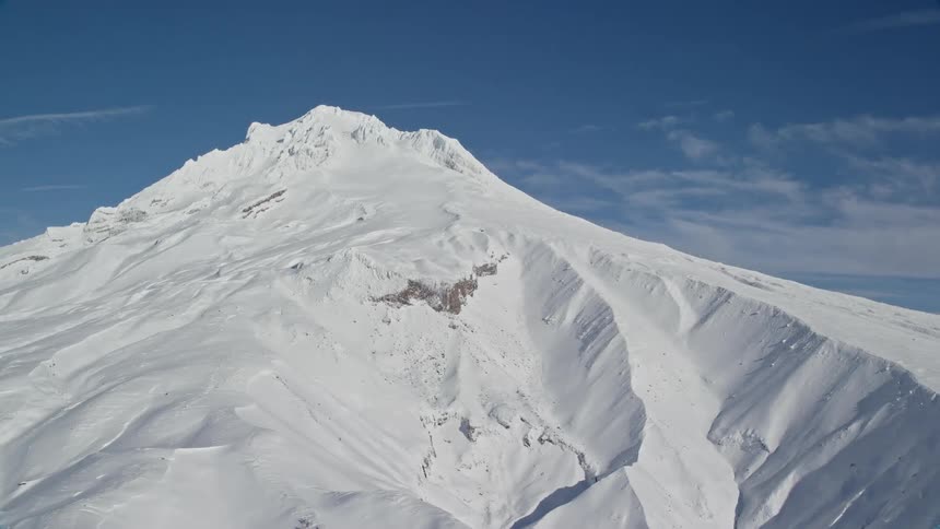 Aerial view of snow capped mountain