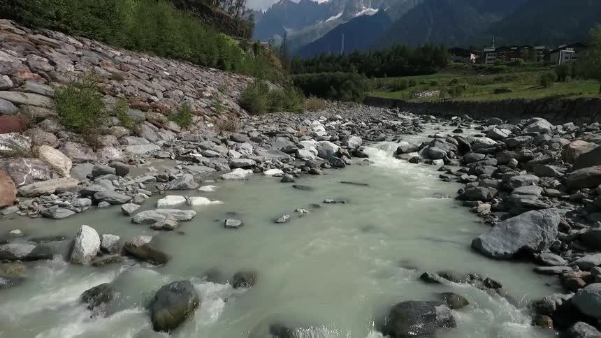 A stream flows through a rocky area