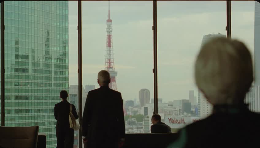 People enter a meeting room in tokyo