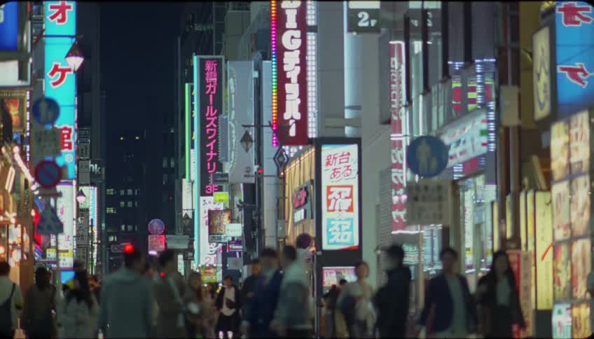 Center of an urban city with crowd at night
