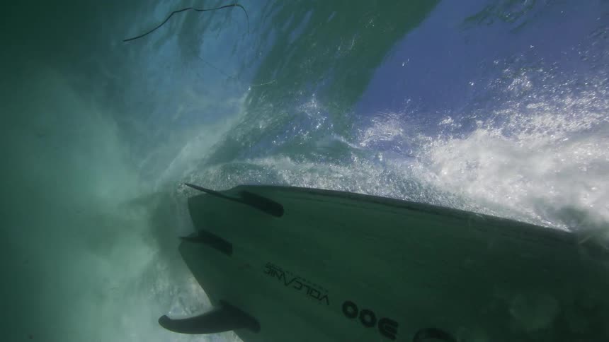 A person is surfing on a wave